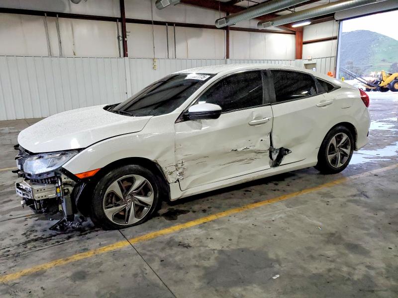 HONDA CIVIC 2019 with VIN 19XFC2F69KE207392 - Photo from auction