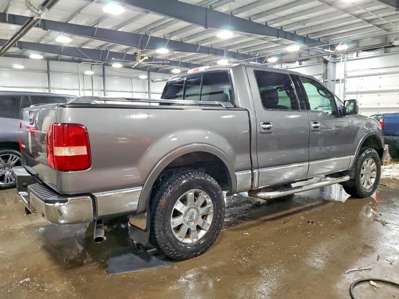 Снимка 3 от търг – 2006 LINCOLN TOWNHOUSE MARK LT с VIN 5LTPW18576FJ13305
