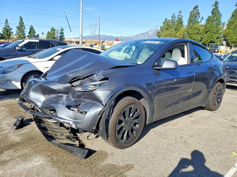 TESLA MODEL Y 2023 with VIN 7SAYGDED2PF947511 - Photo from auction
