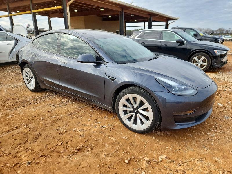 Photo 4 from auction – 2022 TESLA MODEL 3 with VIN 5YJ3E1EB0NF121747