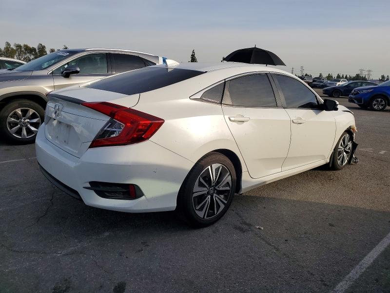 Photo 3 from auction – 2018 HONDA CIVIC EX with VIN JHMFC1F44JX001371