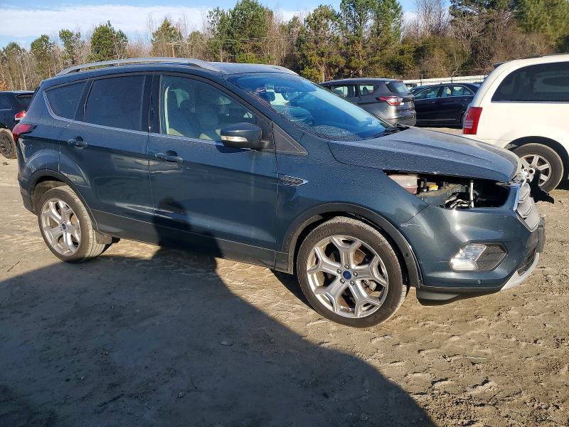 Photo 4 from auction – 2019 FORD ESCAPE TIT with VIN 1FMCU0J94KUC18609