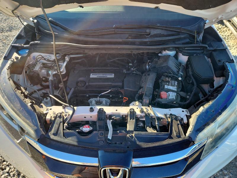 Photo 11 from auction – 2015 HONDA CR-V EXL with VIN 5J6RM3H79FL009795