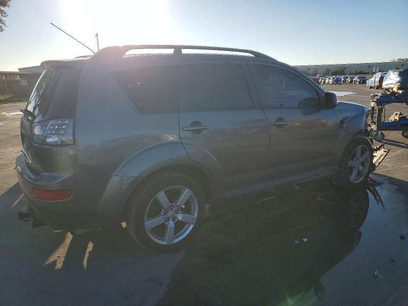 Photo 3 from auction – 2009 MITSUBISHI OUTLANDER with VIN JA4LS21W79Z013935