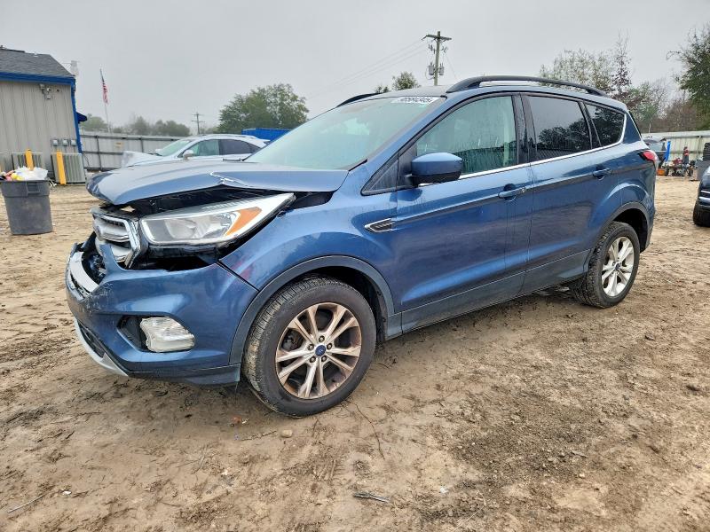 FORD ESCAPE 2018 with VIN 1FMCU0GDXJUA61002 - Photo from auction