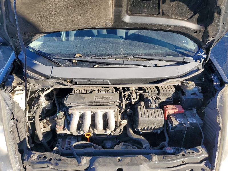 Photo 11 from auction – 2009 HONDA FIT with VIN JHMGE87279S069919