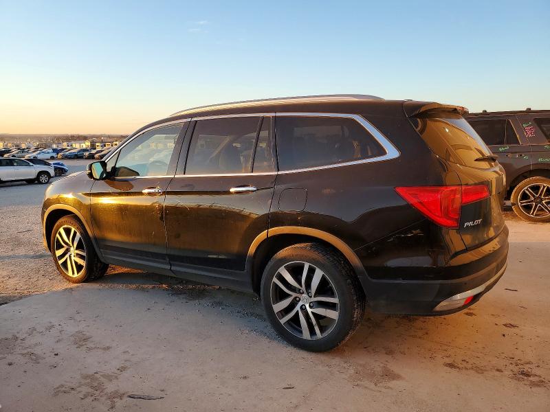 Photo 2 from auction – 2016 HONDA PILOT with VIN 5FNYF6H92GB003940