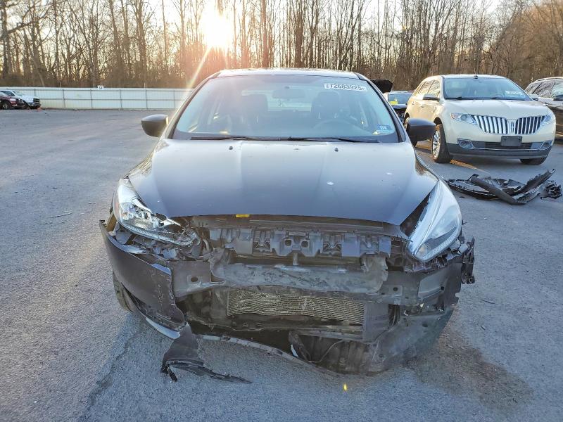 Photo 5 from auction – 2016 FORD FOCUS S with VIN 1FADP3E27GL203040