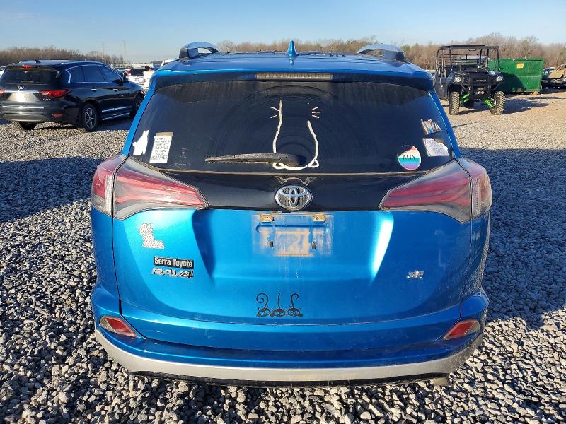 Photo 6 from auction – 2016 TOYOTA RAV4 with VIN JTMNFREV5GJ078372