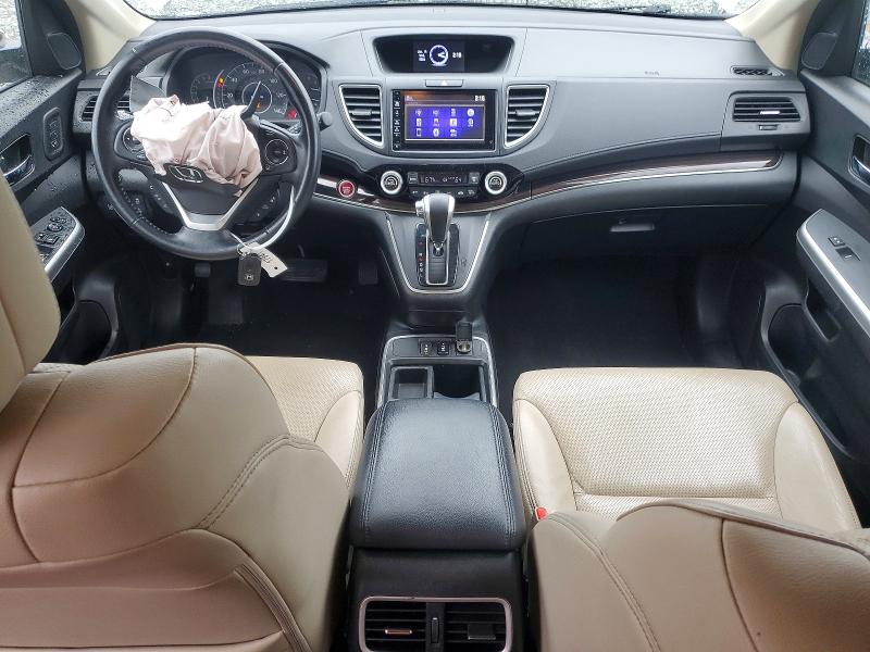 Photo 8 from auction – 2015 HONDA CR-V TOURI with VIN 5J6RM3H99FL014240