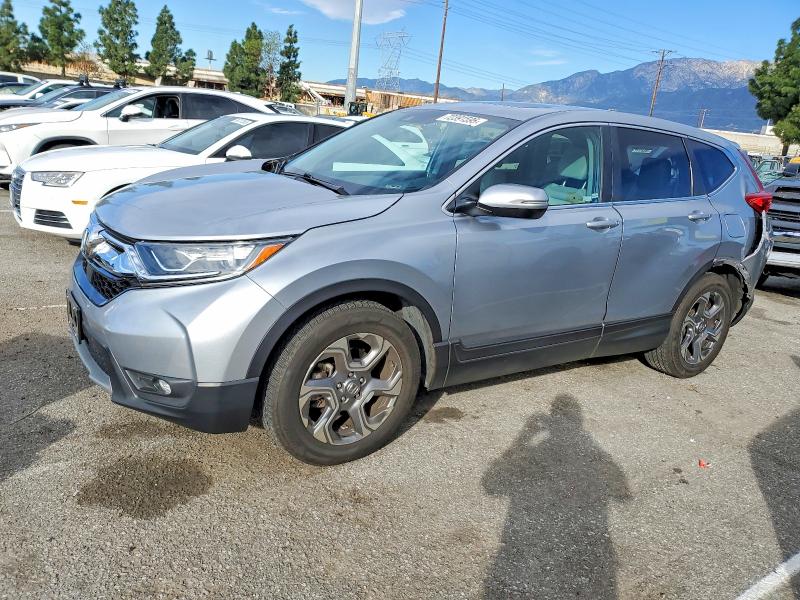 HONDA CR-V EX 2018 with VIN 5J6RW1H57JA000286 - Photo from auction