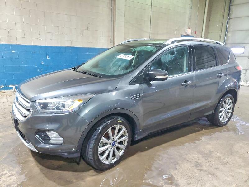 FORD ESCAPE TIT 2017 with VIN 1FMCU0J97HUA21586 - Photo from auction