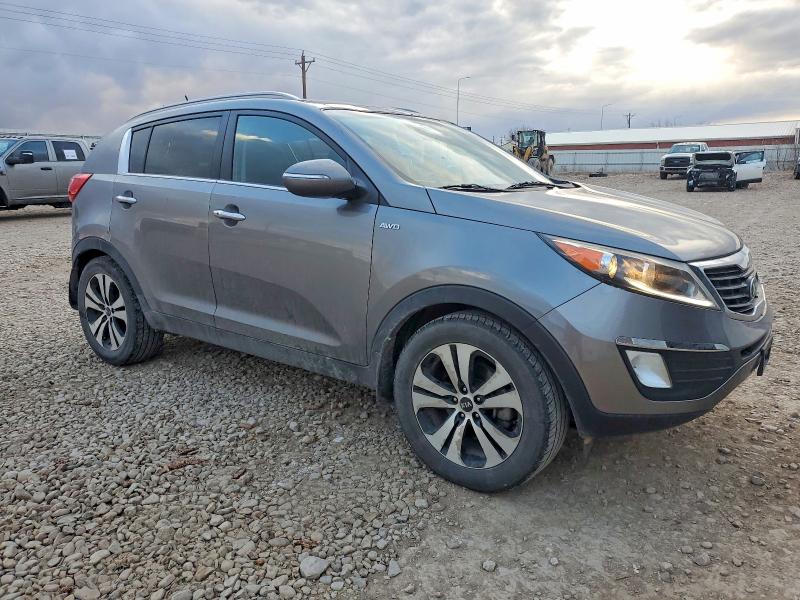 Photo 4 from auction – 2013 KIA SPORTAGE E with VIN KNDPCCA2XD7428002