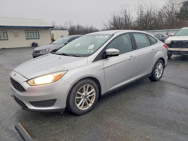 FORD FOCUS SE 2015 with VIN 1FADP3F20FL237933 - Photo from auction