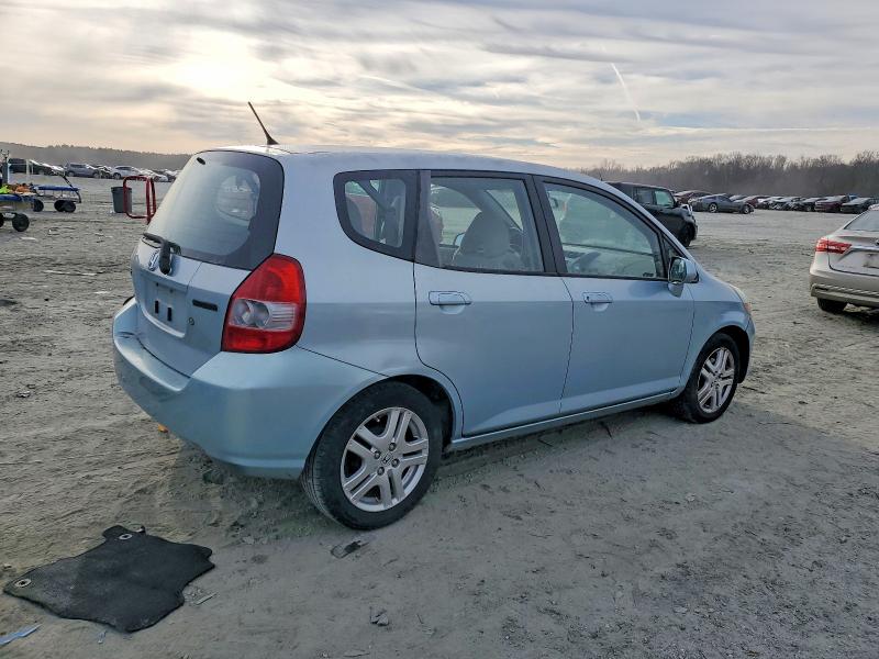 Photo 3 from auction – 2007 HONDA FIT with VIN JHMGD38457S004540