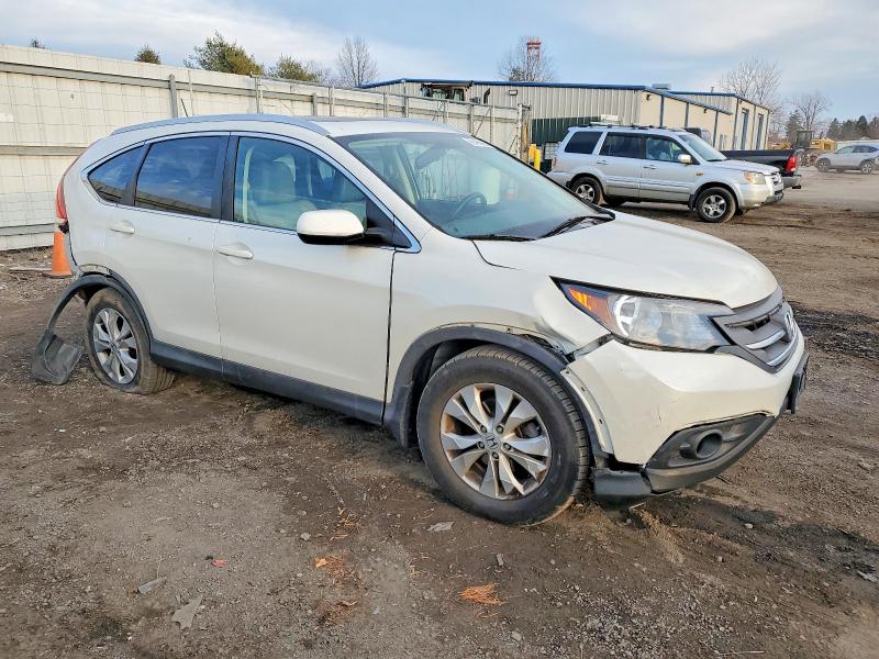 Photo 4 from auction – 2014 HONDA CR-V EXL with VIN 5J6RM3H77EL003640