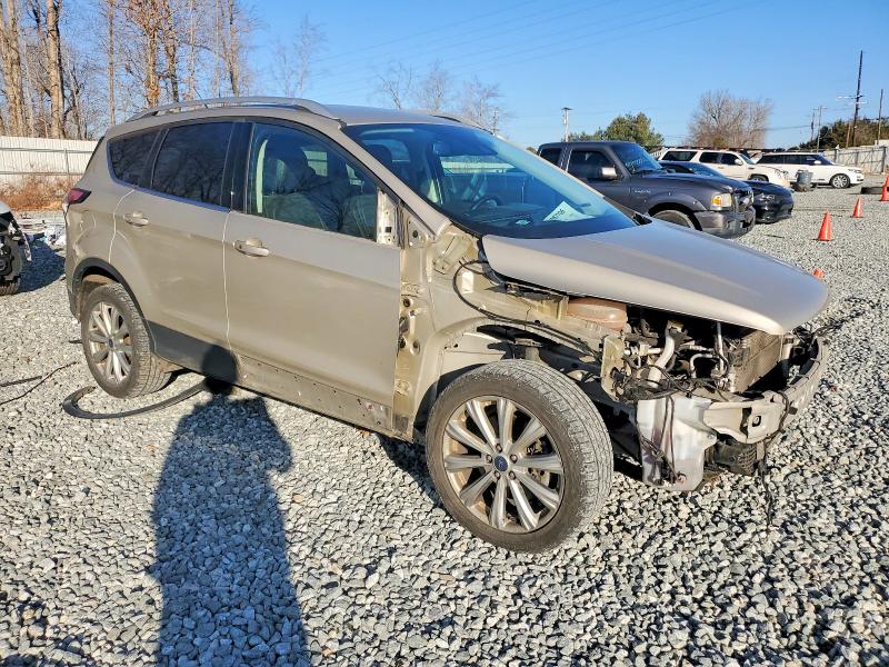 Photo 4 from auction – 2017 FORD ESCAPE TIT with VIN 1FMCU9J96HUC18589
