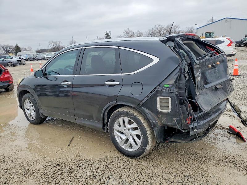 Photo 2 from auction – 2016 HONDA CR-V EXL with VIN 2HKRM3H73GH524528