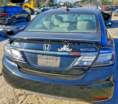 Photo 6 from auction – 2015 HONDA CIVIC HYBR with VIN 19XFB4F27FE002123