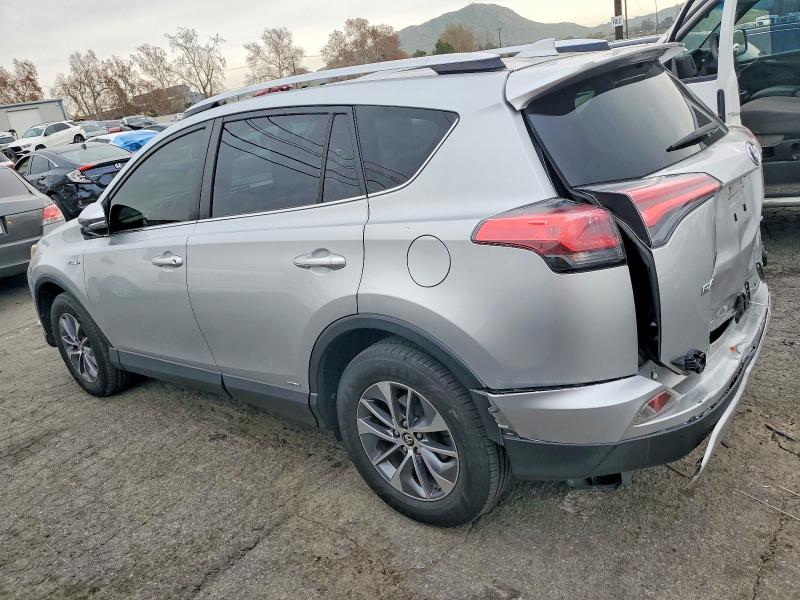Photo 2 from auction – 2016 TOYOTA RAV4 HV with VIN JTMRJREV5GD006957