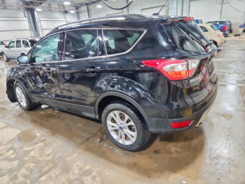 Photo 2 from auction – 2017 FORD ESCAPE SE with VIN 1FMCU9GD5HUD52182