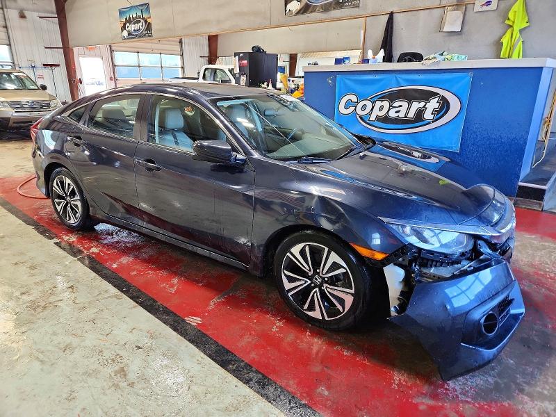Photo 4 from auction – 2018 HONDA CIVIC with VIN JHMFC1F36JX019992