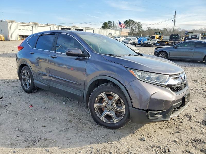 Photo 4 from auction – 2017 HONDA CR-V with VIN 7FARW1H88HE035490