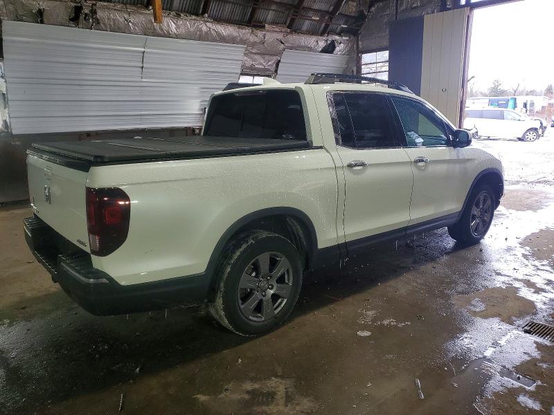 Photo 3 from auction – 2020 HONDA RIDGELINE with VIN 5FPYK3F76LB002464