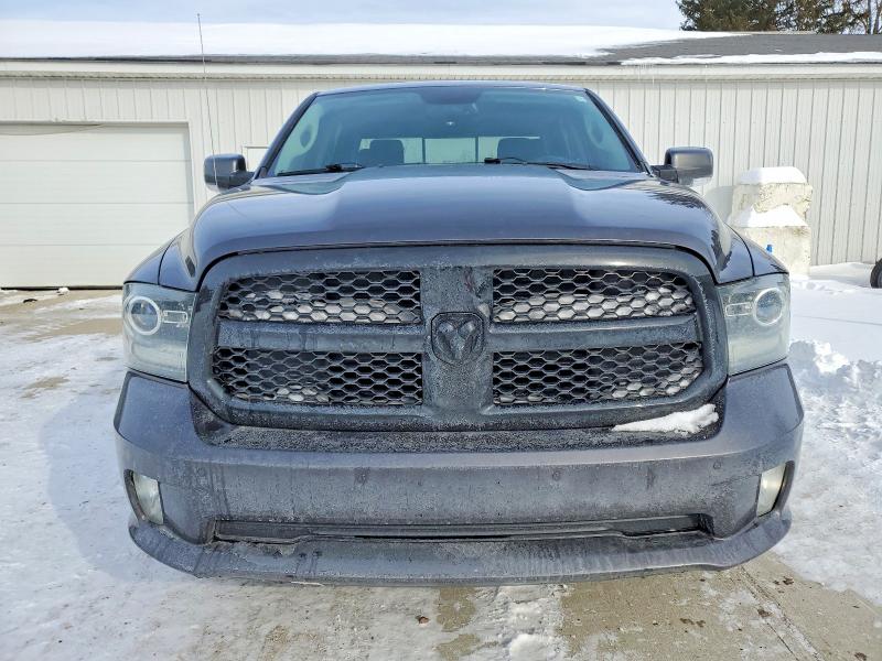Photo 5 from auction – 2018 RAM 1500 with VIN 1C6RR7MT6JS209802
