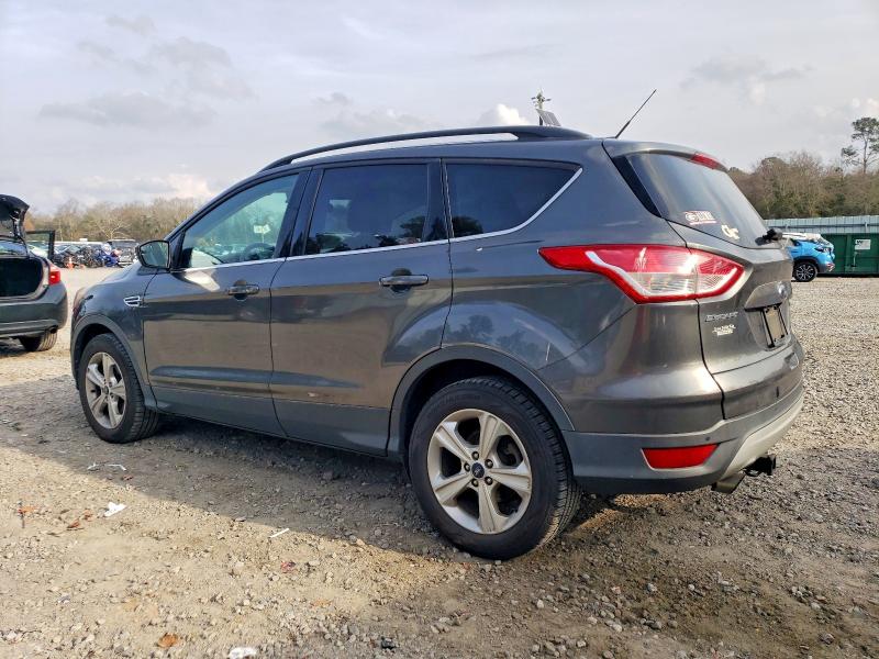 Photo 2 from auction – 2016 FORD ESCAPE SE with VIN 1FMCU0GX6GUB79275