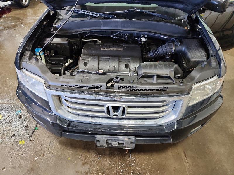 Photo 11 from auction – 2012 HONDA RIDGELINE with VIN 5FPYK1F59CB003806