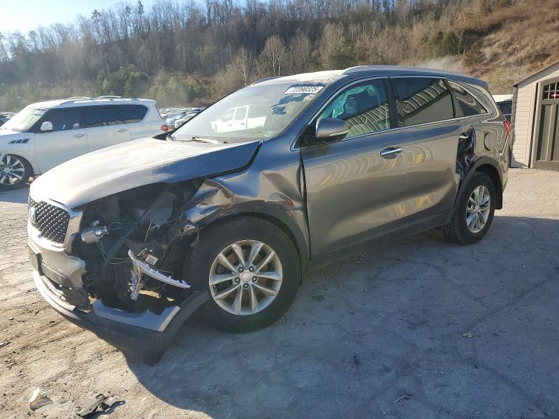 KIA SORENTO 2016 with VIN 5XYPG4A32GG074342 - Photo from auction
