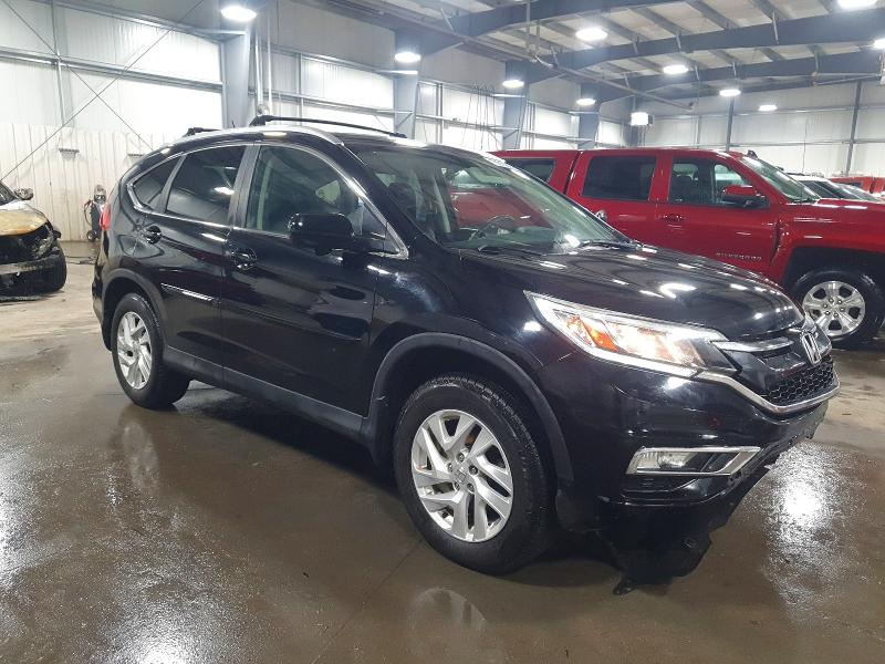 Photo 4 from auction – 2015 HONDA CR-V with VIN 2HKRM4H74FH613884
