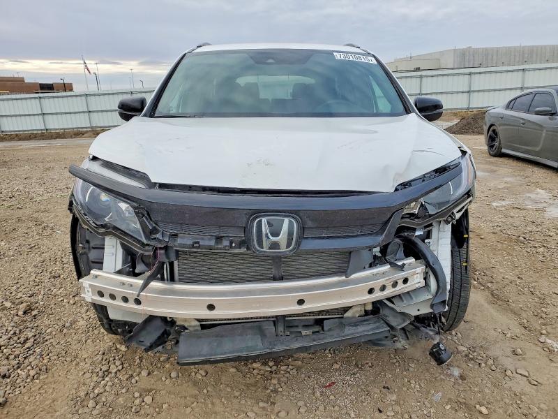 Photo 5 from auction – 2022 HONDA PILOT SPOR with VIN 5FNYF6H35NB082545