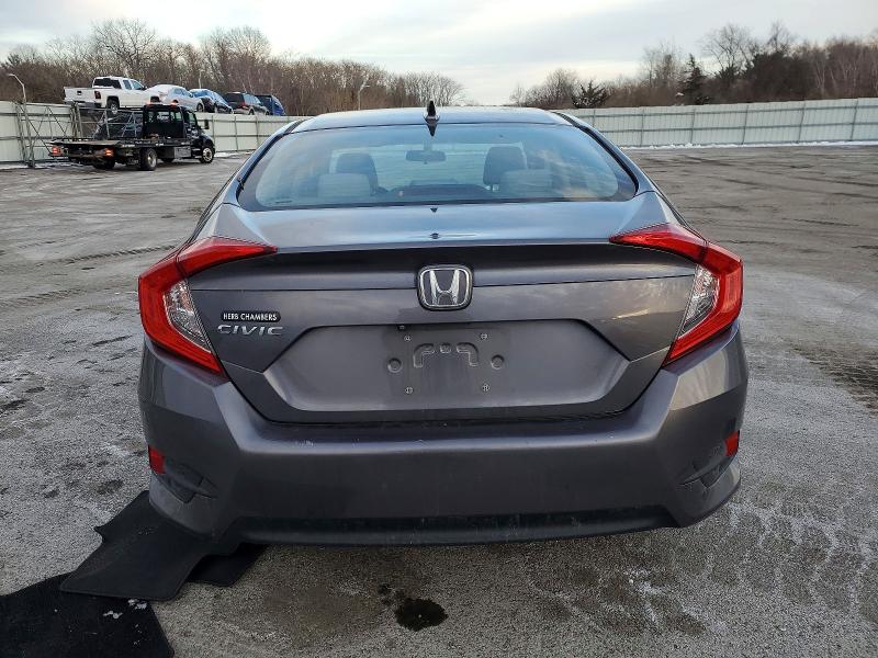 Photo 6 from auction – 2017 HONDA CIVIC EX with VIN 19XFC2F74HE218334