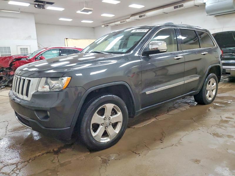JEEP GRAND CHER 2011 with VIN 1J4RR5GG0BC686260 - Photo from auction