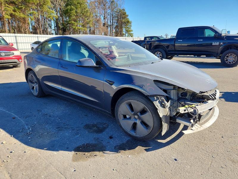 Photo 4 from auction – 2021 TESLA MODEL 3 with VIN 5YJ3E1EA7MF056918