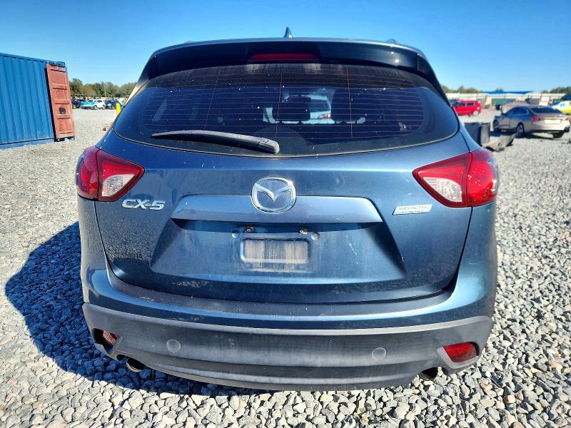 Photo 6 from auction – 2015 MAZDA CX-5 with VIN JM3KE2BE1F0460623