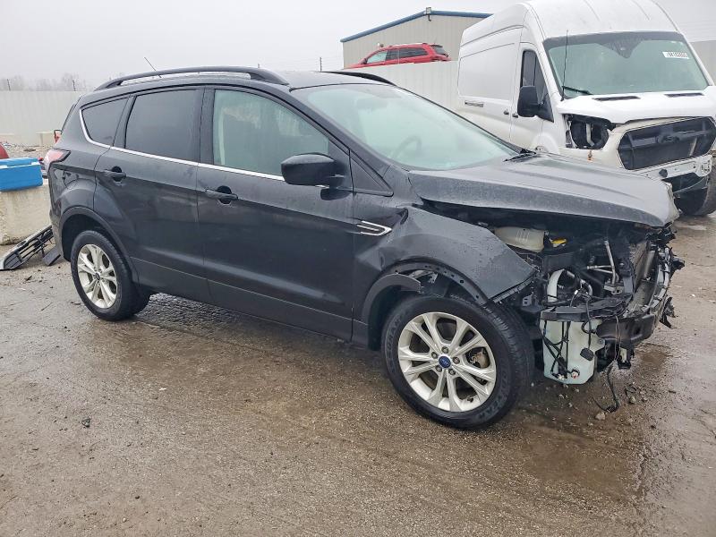 Photo 4 from auction – 2018 FORD ESCAPE SE with VIN 1FMCU9GD1JUB04291