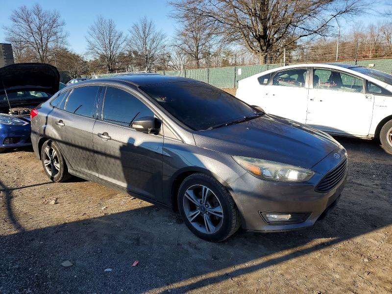 Photo 4 from auction – 2016 FORD FOCUS with VIN 1FADP3FE8GL224391