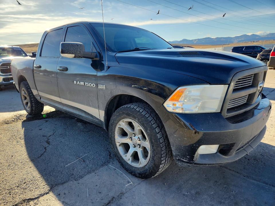 Photo 4 from auction – 2011 DODGE RAM 1500 with VIN 1D7RV1CT6BS590335