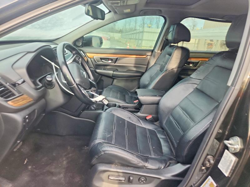Photo 7 from auction – 2018 HONDA CR-V with VIN 7FARW1H92JE010180