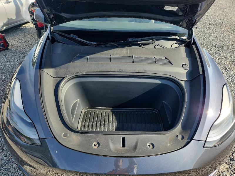 Photo 12 from auction – 2022 TESLA MODEL Y with VIN 7SAYGDEF2NF378187