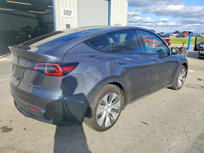 Photo 3 from auction – 2023 TESLA MODEL Y with VIN 7SAYGAEE4PF612385