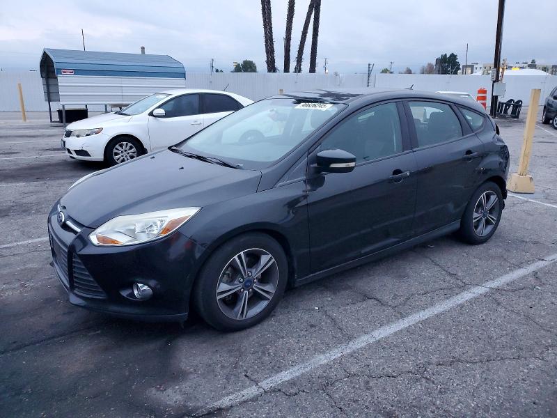 FORD FOCUS SE 2014 with VIN 1FADP3K24EL453238 - Photo from auction