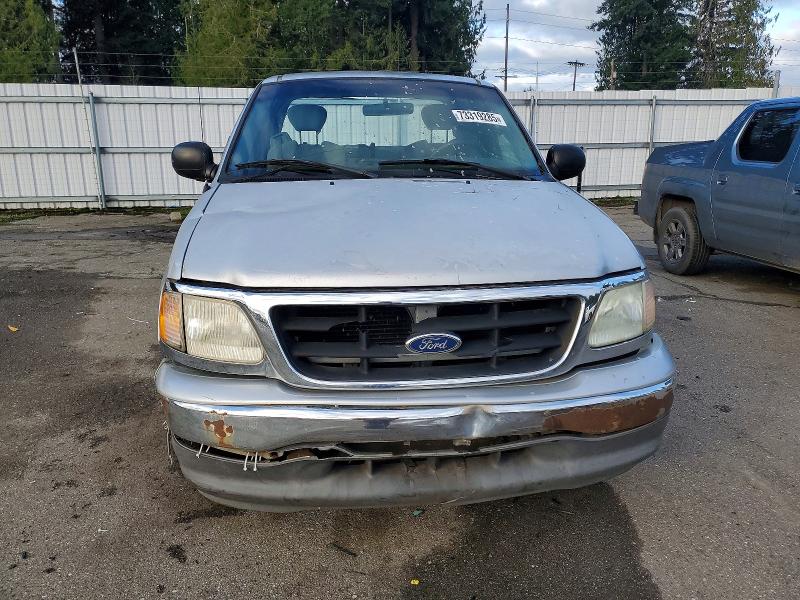 Photo 5 from auction – 2003 FORD F150 with VIN 1FTRX17233NB67850
