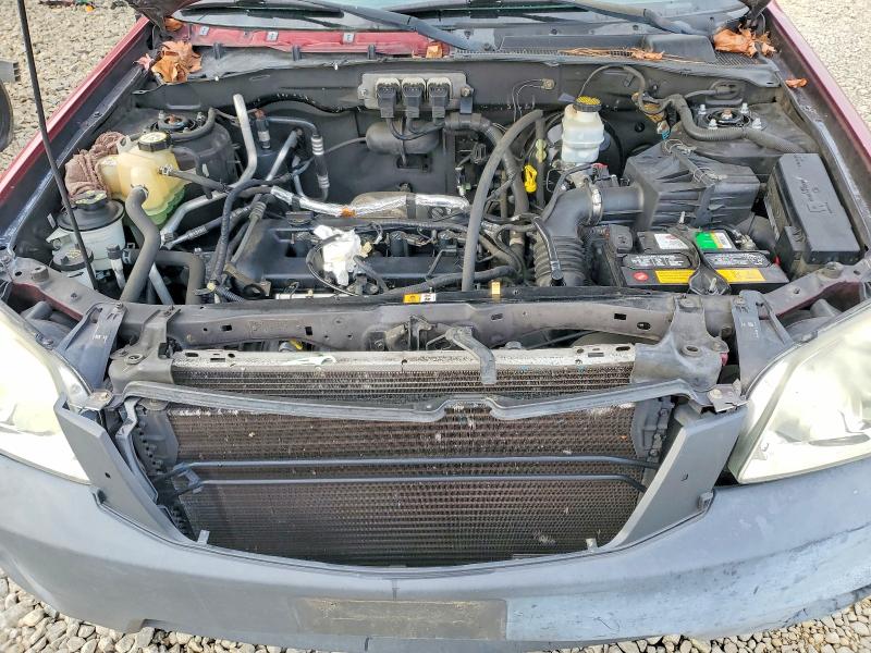 Photo 12 from auction – 2005 MAZDA TRIBUTE with VIN 4F2YZ02ZX5KM53462