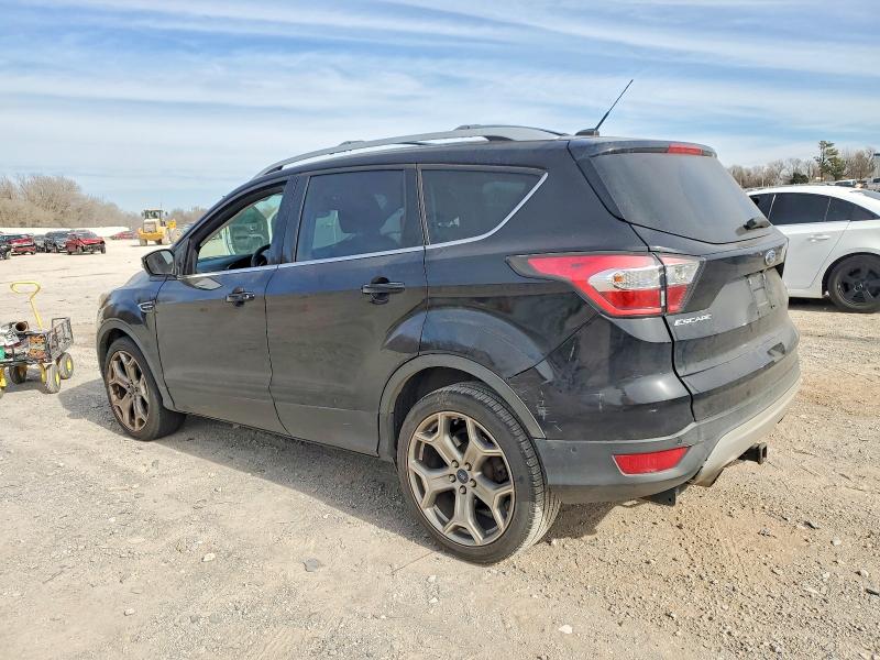 Photo 2 from auction – 2017 FORD ESCAPE TIT with VIN 1FMCU0JD2HUA27087
