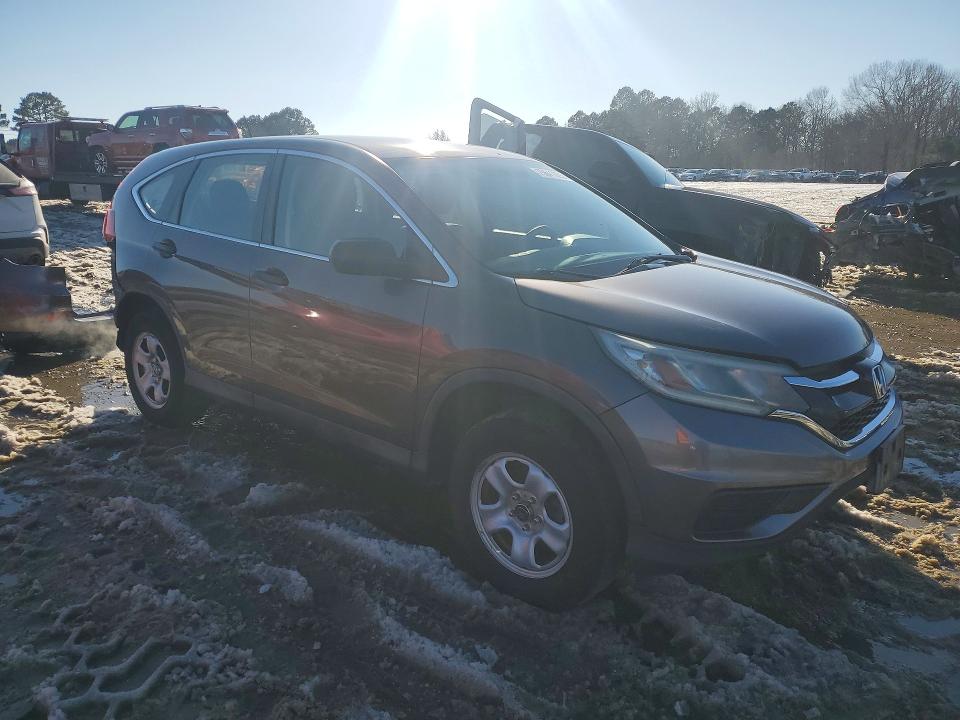 Photo 4 from auction – 2015 HONDA CR-V with VIN 2HKRM4H38FH600469