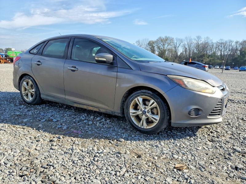Photo 4 from auction – 2014 FORD FOCUS with VIN 1FADP3F21EL238555